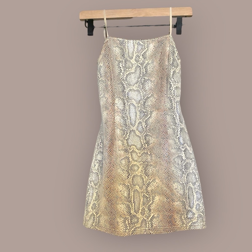 Urban Outfitters short dress with lace up back. Irredentist snakeskin print.